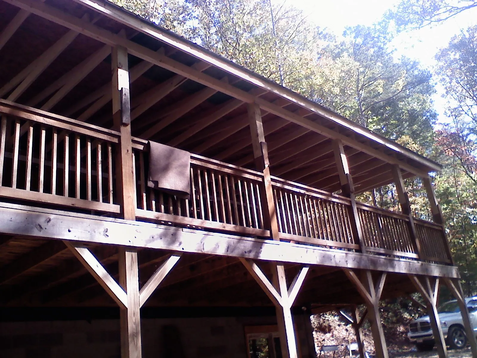 Timber framing under a new elevated porch and deck — Roof Leak Repair in Mccloud by Roofing Brothers